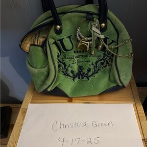 Vintage Juicy Couture bowler with the rhinestone ring in front.